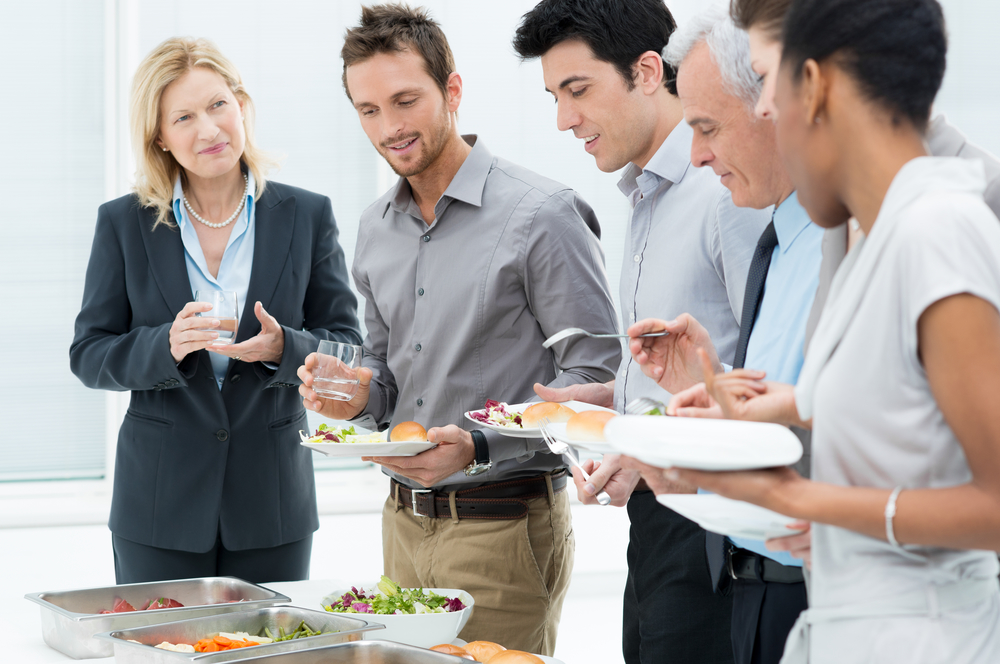 business people having meal together